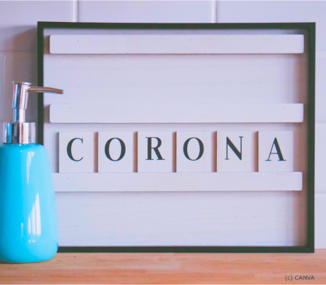 Text Corona und Desinfektionsspender zu Zeiten von